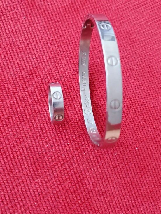 Jewelry - Stainless steel screw motif bangle and matching ring set.